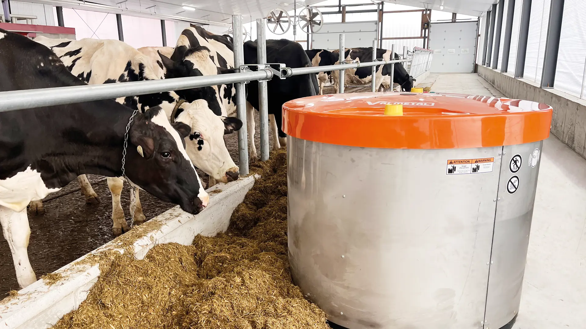 Robotic feed pusher